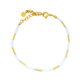 Bracelet doré en pierre de lune et tubes dorés