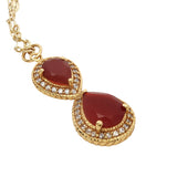 Collier doré infini onyx rouge et zircons 50 cm
