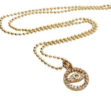 Collier doré petit médaillon avec zircons et oeil 38 cm