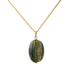Golden necklace with large scarab stone