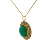 Collier doré médaillon onyx verte et zircons blancs