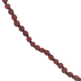 Collier doré petites perles rouges avec noeuds rouges 75 cm