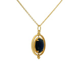 Golden necklace with swivel cabochon stone pendant