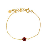Golden bracelet with red eye and golden beads