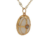 Collier doré pendentif ovale pierre de lune et cage 50 cm