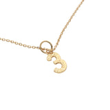Hammered number gold necklace