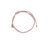 Bracelet brésilien doré fil tissé rose et crème "peace"