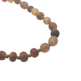 Collier doré mix perles marrons et noeuds marrons 75 cm