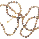 Collier doré mix perles marrons et noeuds marrons 75 cm