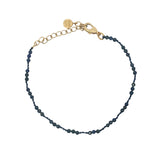 Bracelet doré lapis lazulis et noeuds bleu foncé