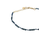 Bracelet doré lapis lazulis et noeuds bleu foncé