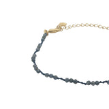 Bracelet doré iolite et noeuds violets