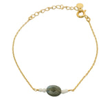 Bracelet doré pierre ovale facettée et petites pierres