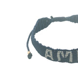 Bracelet brésilien doré fil tissé bleu marine et crème "amore"
