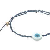 Bracelet doré cordon tressé bleu marine oeil rond nacre
