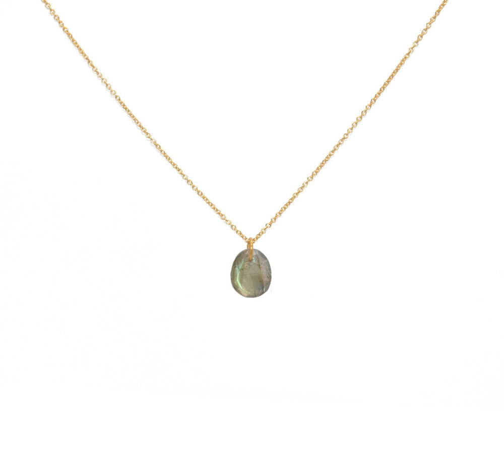 Gold necklace with faceted stone pendant