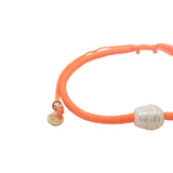 Bracelet doré cordon orange fluo perle de culture