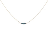 Gold choker with small natural stones