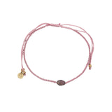 Bracelet doré cordon tressé rose avec tourmaline