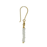 Golden earrings with a cascade of stones and zircons