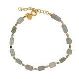 Golden bracelet with stone, tourmaline and golden discs
