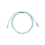 Bracelet brésilien doré fil tissé turquoise et crème "amore"