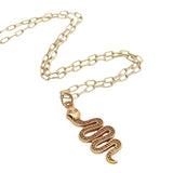 Gold necklace with zircon snake pendant