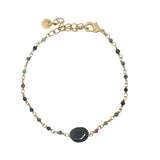 Bracelet doré rubis zoisite et grenat au centre