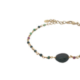 Bracelet doré rubis zoisite et grenat au centre