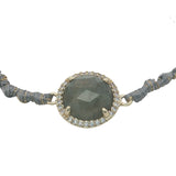 Bracelet doré cordon gris avec labradorite ronde entourée de zircons
