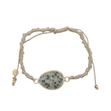Bracelet cordon beige avec jaspe dalmatien cerclé de doré