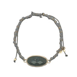Bracelet cordon gris avec labradorite ovale cerclée de doré