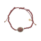 Bracelet doré cordon rouge avec onyx rouge ronde entourée de zircons