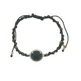 Bracelet doré cordon noir avec onyx noire ronde entourée de zircons