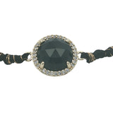 Bracelet doré cordon noir avec onyx noire ronde entourée de zircons