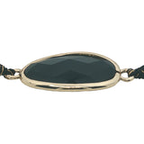 Bracelet cordon noir avec onyx noire ovale cerclée de doré
