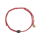 Bracelet doré cordon tressé rouge avec grenat