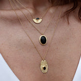 Gold necklace with lapis scarab pendant