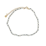 Chaine de cheville dorée en perles de culture et iolite