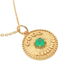 Gold necklace with "good karma" medal, natural stone