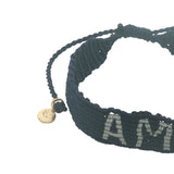 Bracelet brésilien doré fil tissé bleu marine et crème "amour"
