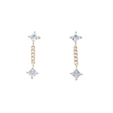 Boucles d'oreilles dorées double zircon avec chainette
