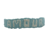 Bracelet brésilien doré fil tissé turquoise et crème 'amour"