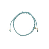 Bracelet brésilien doré fil tissé turquoise et crème 'amour"