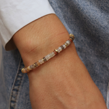 Gold bracelet and heishi stones