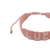 Bracelet brésilien doré fil tissé corail et crème "lucky"