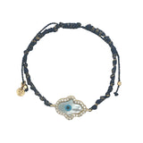 Bracelet doré cordon bleu marine main de Fatma en nacre avec oeil et zircons autour