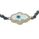 Bracelet doré cordon bleu marine main de Fatma en nacre avec oeil et zircons autour