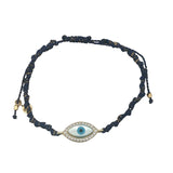 Bracelet doré cordon bleu marine oeil ovale en nacre entouré de zircons