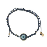 Bracelet doré cordon bleu marine oeil rond cerclé de doré